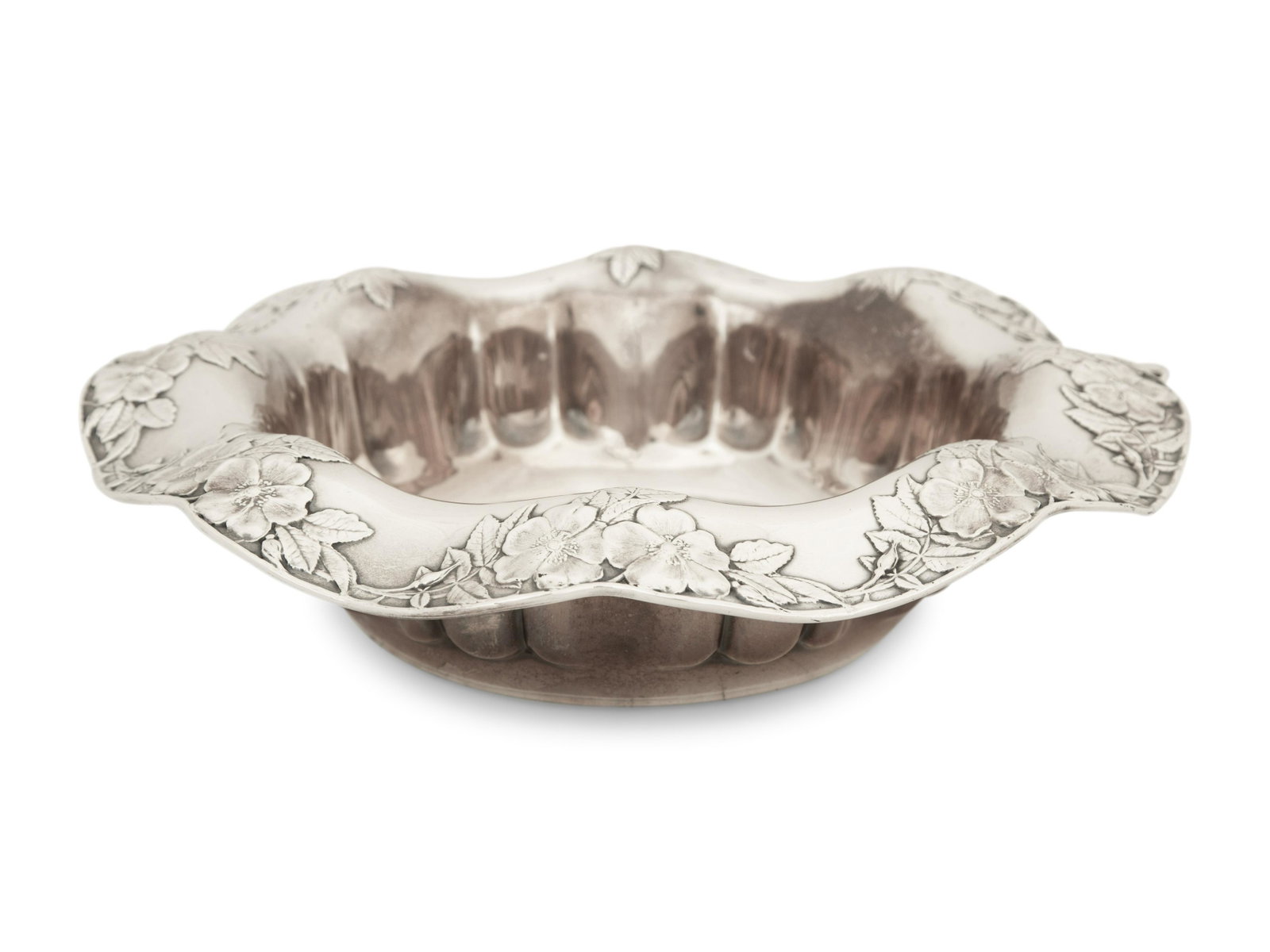 A Tiffany and Co. Silver Bowl: A Tiffany and Co. Silver Bowl Early 20th Century marked 'Sterling' to underside 28 ozt 8 dwts Height 2 1/2 x diameter 12 1/4 inches. Property from the Collection of Robert and Mary Montgomery, Palm Be