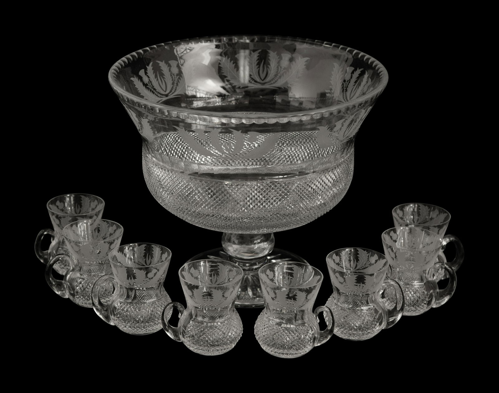 An Edinburgh Crystal Thistle Footed Punchbowl and Eight Punch Cups (1 of 3)