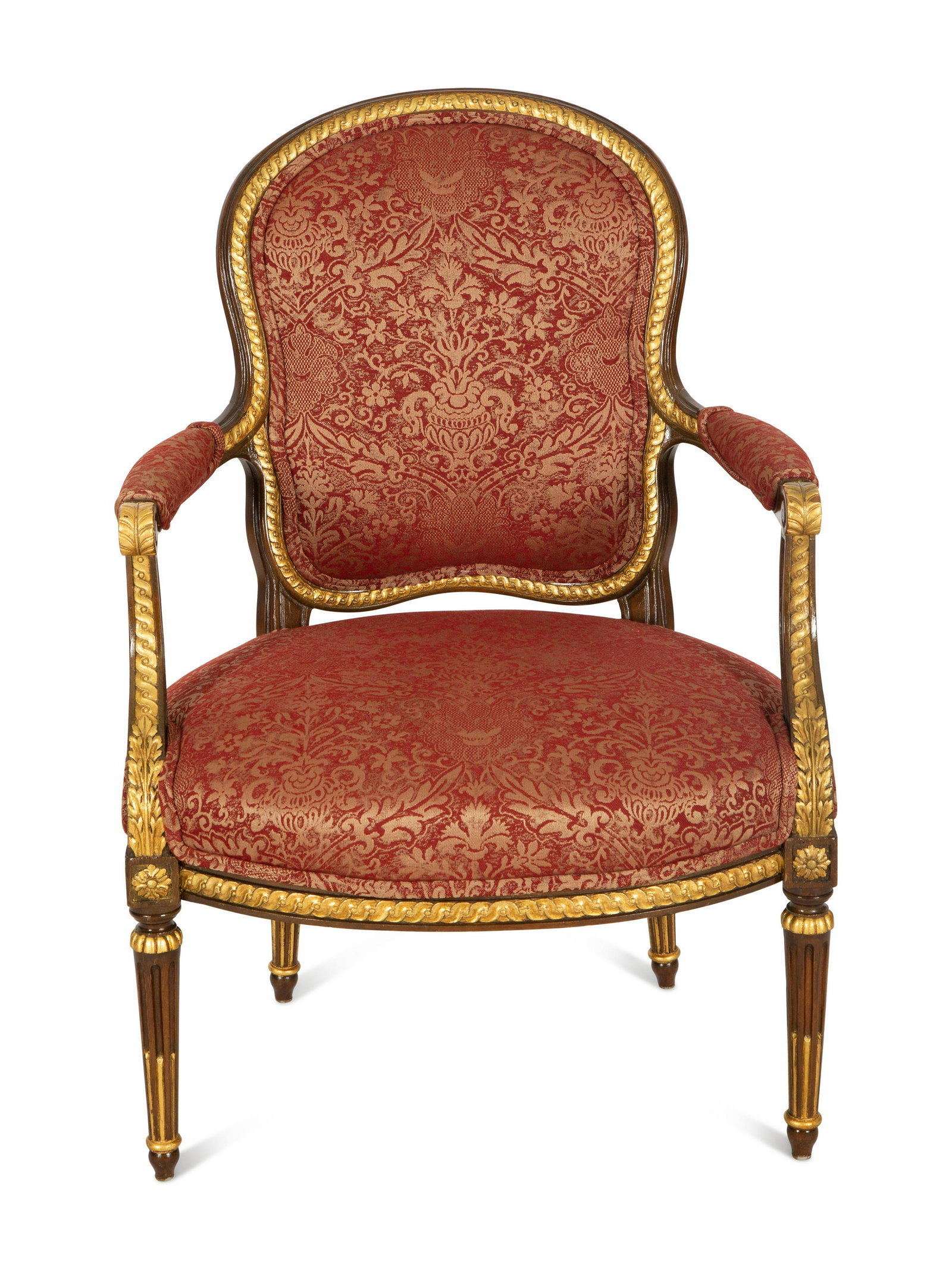 A Louis XVI Style Stained and Gilt Mahogany Fauteuil: A Louis XVI Style Stained and Gilt Mahogany Fauteuil 20th Century Height 37 x width 26 inches. Property from the Collection of Robert and Mary Montgomery, Palm Beach, Florida