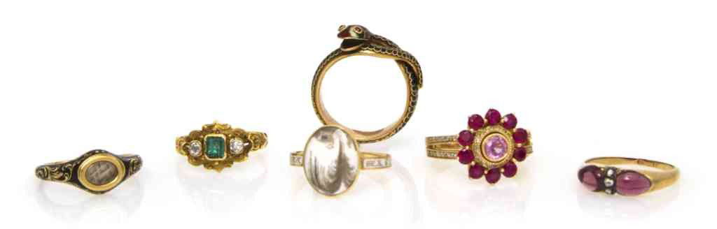 A Group of Vintage Yellow Gold Jewelry, 14.80 dwts.: A Group of Vintage Yellow Gold Jewelry, consisting of six rings including two 18 karat gold and enamel remembrance rings, an 18 karat gold, emerald and diamond memorial ring, a 14 karat gold, ruby, p