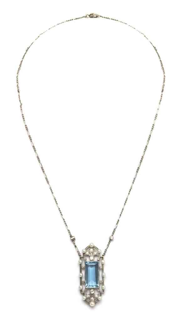 An Edwardian Platinum, Aquamarine, Pearl and Diamon: An Edwardian Platinum, Aquamarine, Pearl and Diamond Necklace, in an openwork design, containing one rectangular step cut aquamarine measuring approximately 3.50 carats, 12 pearls (origin not tested) 