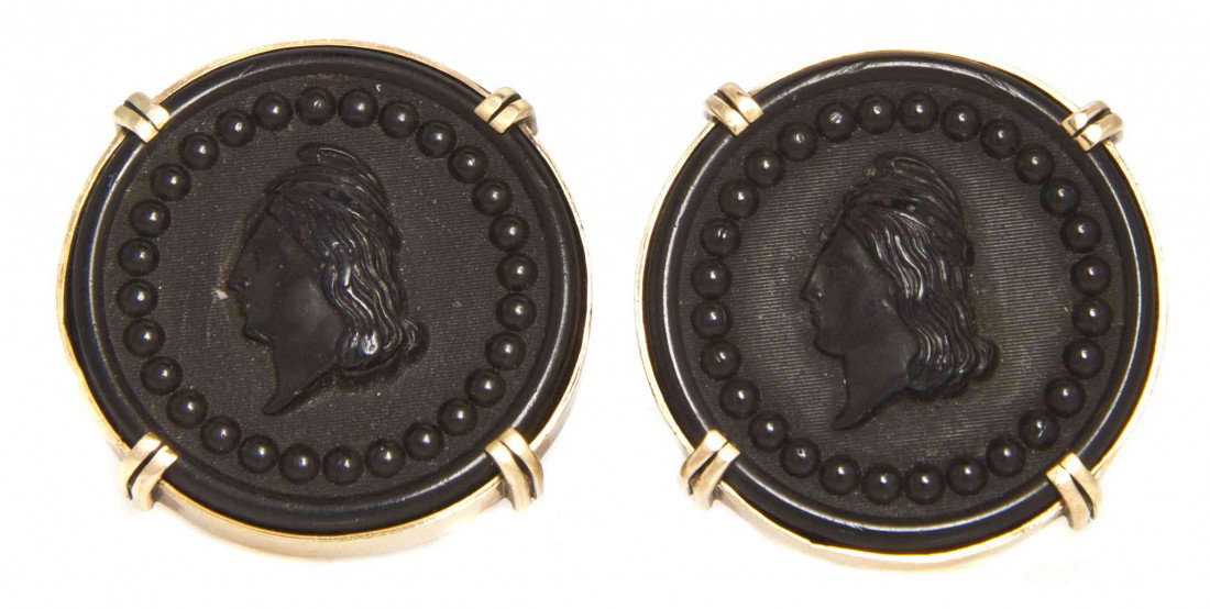 A Pair of 14 Karat Yellow Gold and Ceramic Intagli: A Pair of 14 Karat Yellow Gold and Ceramic Intaglio Cufflinks, intaglios measuring approximately 31.00 mm in diameter. STAMP: 14K. 8.30 dwts.