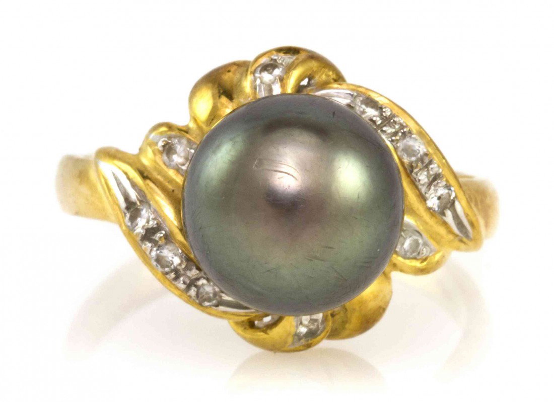 A Yellow Gold, Cultured Tahitian Pearl and Diamon: A Yellow Gold, Cultured Tahitian Pearl and Diamond Ring, containing one pearl measuring approximately 10.35 mm in diameter and 10 round brilliant cut diamonds weighing approximately 0.10 carat total. 