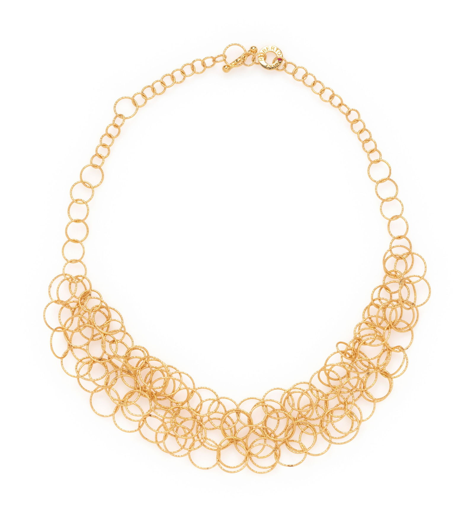 ROBERTO COIN, YELLOW GOLD 'MAURESQUE' NECKLACE: ROBERTO COIN, YELLOW GOLD 'MAURESQUE' NECKLACE Consisting of interlocking textured round gold links in a bib style. 13 1/2-16 inches long. Stamp: ROBERTO COIN ITALY 18KT (Italian hallmark). Gross weig