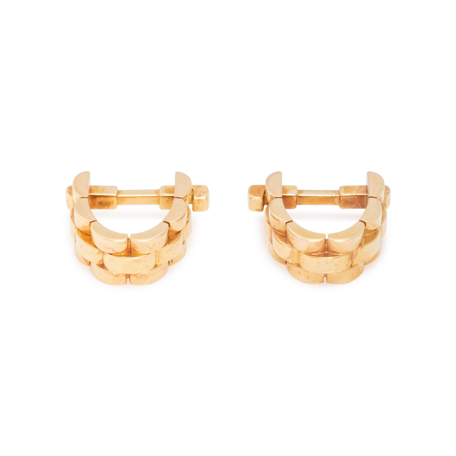 CARTIER, YELLOW GOLD 'MAILLON PANTHER STIRRUP' CUFFLINKS: CARTIER, YELLOW GOLD 'MAILLON PANTHER STIRRUP' CUFFLINKS Consisting of a triple row brick link design. 3/4 inch wide. Stamp: Cartier 750 (maker's mark) AV2343. Gross weight: 11.85 dwt. Accompanied by 