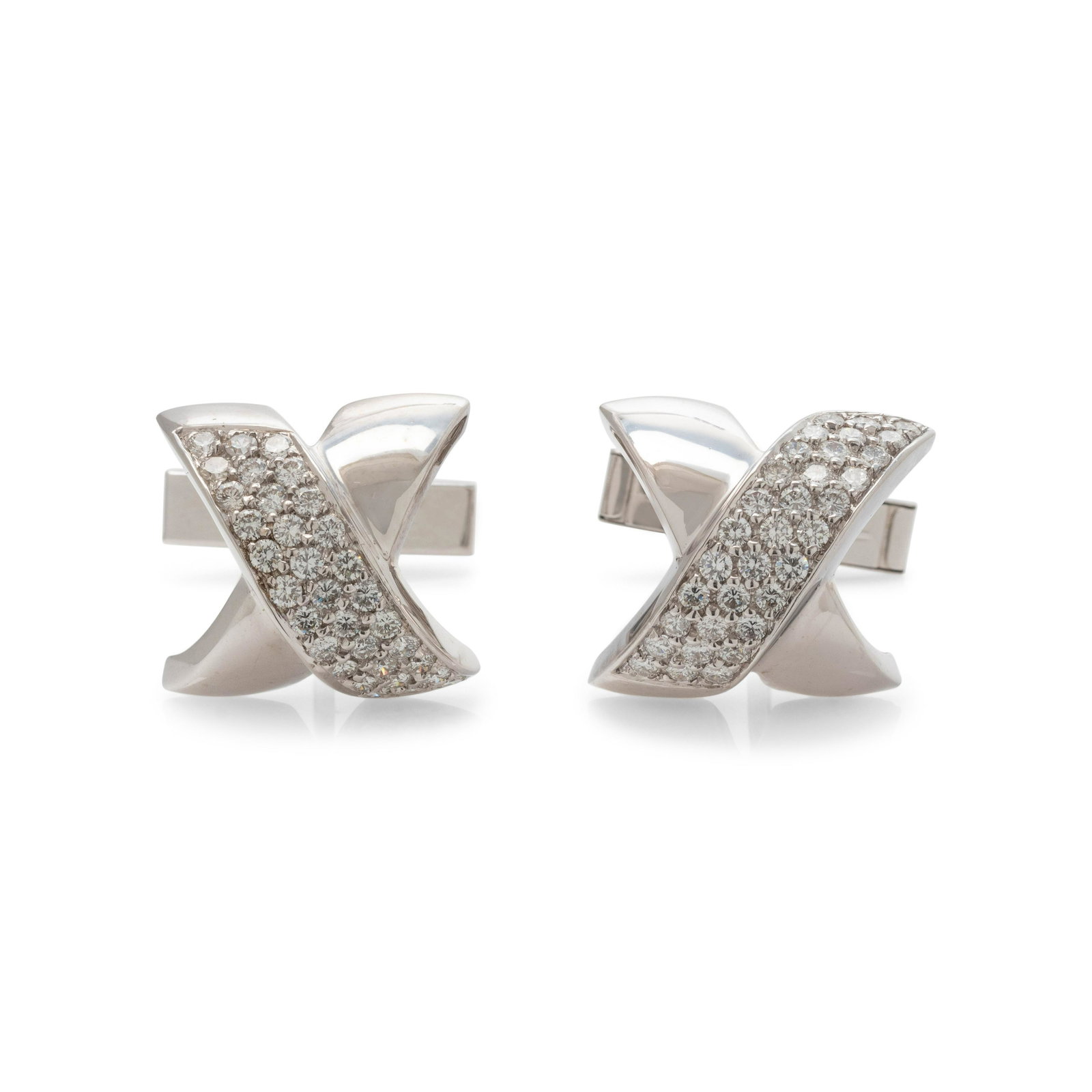 WHITE GOLD AND DIAMOND 'X' CUFFLINKS: WHITE GOLD AND DIAMOND 'X' CUFFLINKS Containing 66 round brilliant cut diamonds weighing approximately 1.30 carats total. 5/8 inch wide. Stamp: 18K. Mechanism stamp: 14K. Gross weight: 8.20 dwt.