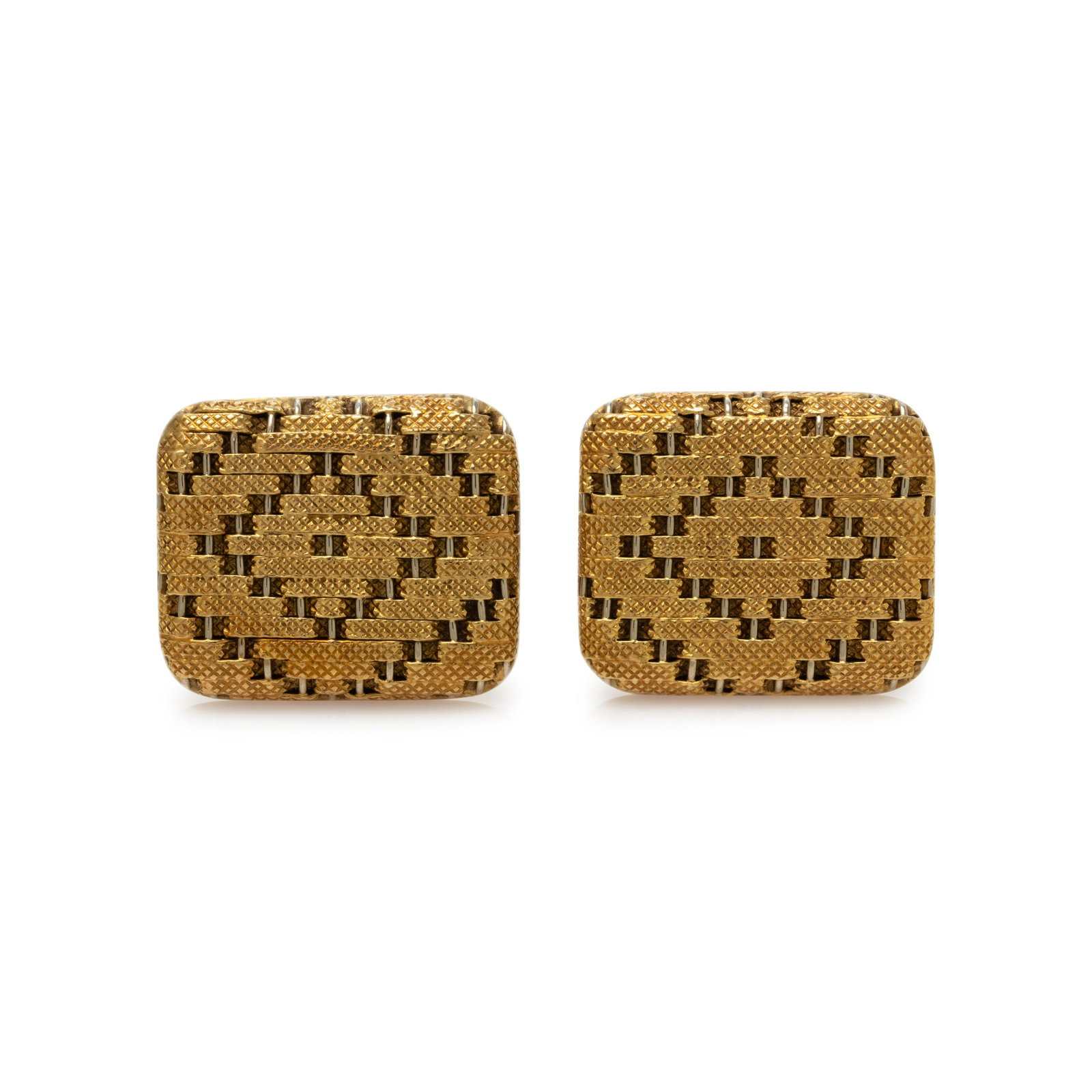 TIFFANY & CO., YELLOW GOLD CUFFLINKS: TIFFANY & CO., YELLOW GOLD CUFFLINKS Consisting of cushion shaped ends with textured yellow gold and white gold wire detail. 3/4 x 7/8 inch. Stamp: 18K ITALY TIFFANY & CO. Gross weight: 15.35 dwt. 