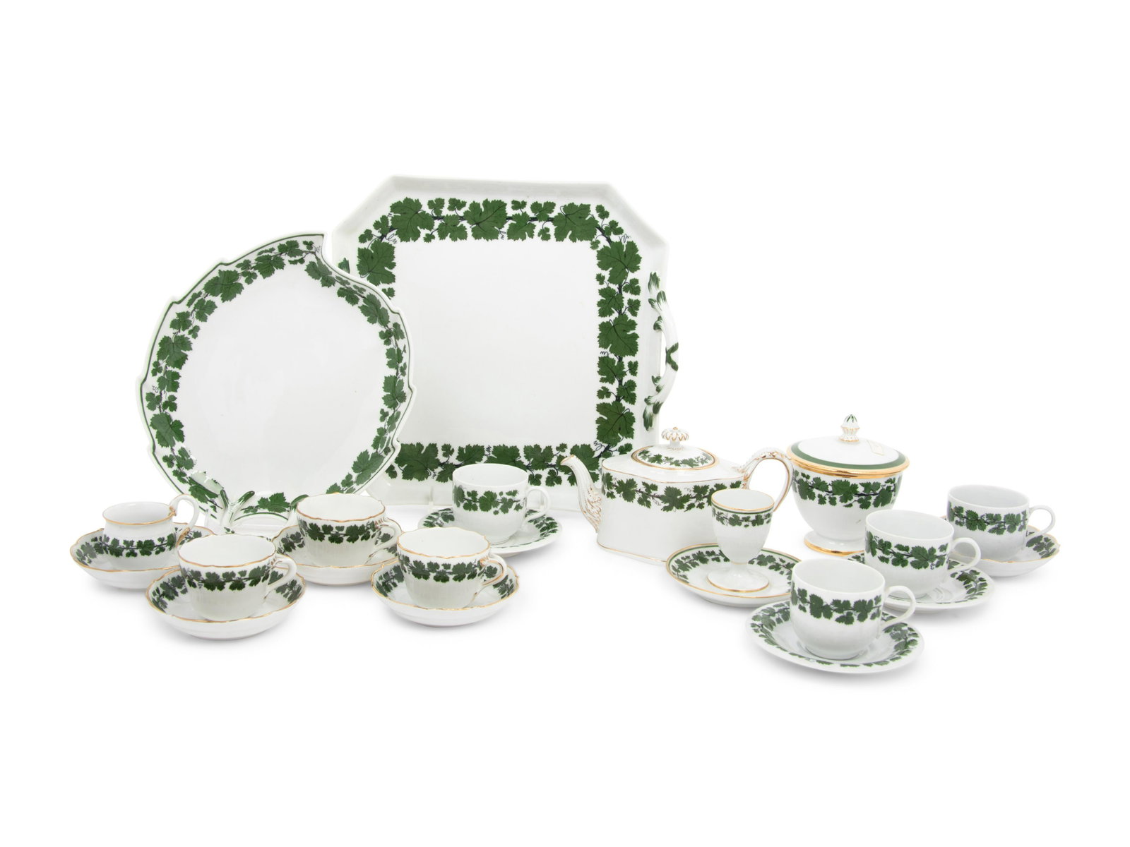 A Meissen Green Vine Porcelain Tea Service : A Meissen Green Vine Porcelain Tea Service having slight variations in pattern throughout, each bearing a variation of crossed swords mark in underglaze blue with other marks to the under