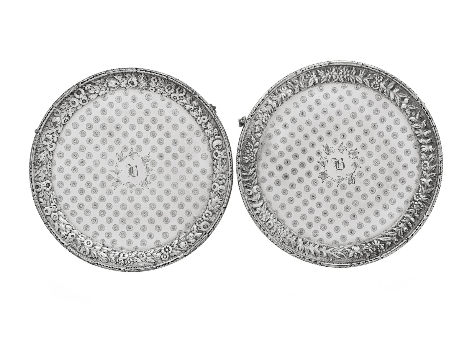 A Pair of S. Kirk and Son Silver Waiters: A Pair of S. Kirk and Son Silver Waiters Baltimore, MD, 19th Century each with engraved script monogram 'B' to the center. marked '11 oz' to underside 17 ozt 15 dwt Height 1 x diameter 8 inches. 