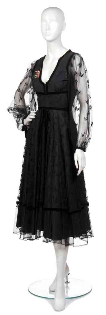 A Thea Porter Black Silk and Lace Evening Dress: A Thea Porter Black Silk and Lace Evening Dress with handpainted flowers at bodice. Labeled: Thea Porter Couture.