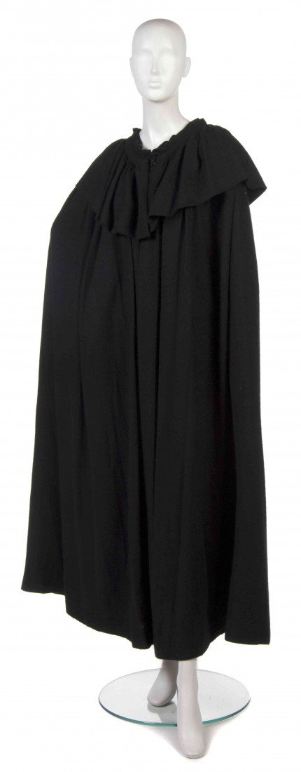 An Yves Saint Laurent Black Wool Cape.: An Yves Saint Laurent Black Wool Cape. Labeled: Saint Laurent.