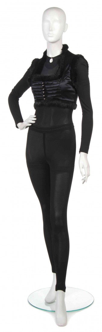 An Ozbek Black Lycra Jumpsuit with Matching Fur Tr: An Ozbek Black Lycra Jumpsuit with Matching Fur Trimmed Vest. Labeled: Ozbek.