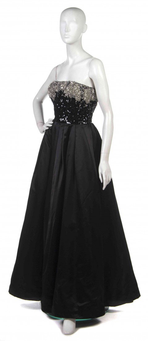 An Oscar de la Renta Black Silk and Sequin Evening: An Oscar de la Renta Black Silk and Sequin Evening Gown, bodice with all-over sequins and beads, very full skirt. No label.