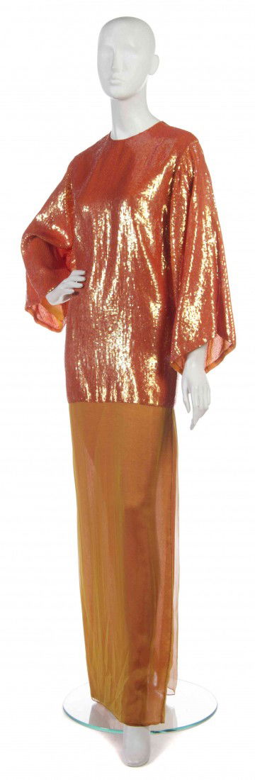 An Oscar de la Renta Orange Sequin and Silk Evenin: An Oscar de la Renta Orange Sequin and Silk Evening Ensemble, dress with all-over sequins at top, silk skirt, together with a matching duster jacket. Labeled: Oscar de la Renta.