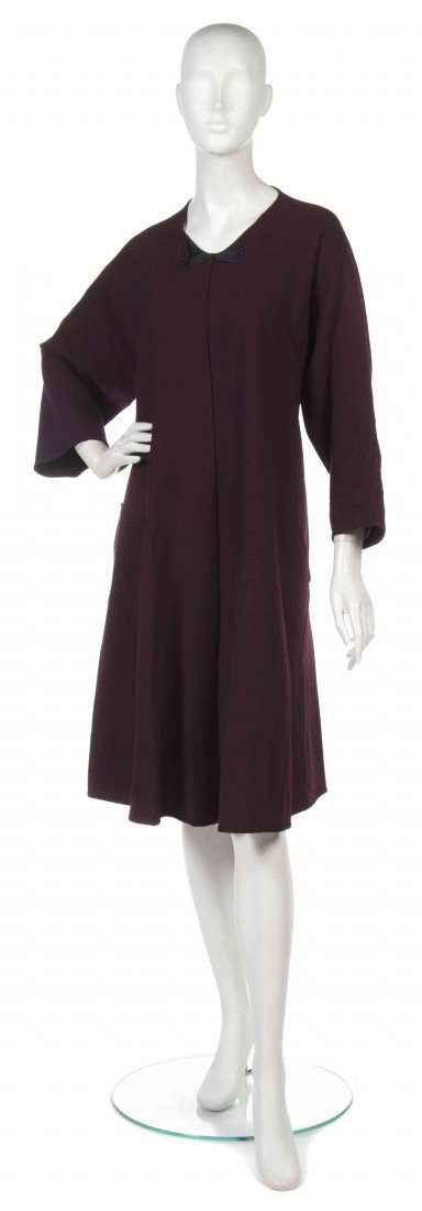 A Geoffrey Beene Burgundy Wool Swing Dress.: A Geoffrey Beene Burgundy Wool Swing Dress. Labeled: Geoffrey Beene.
