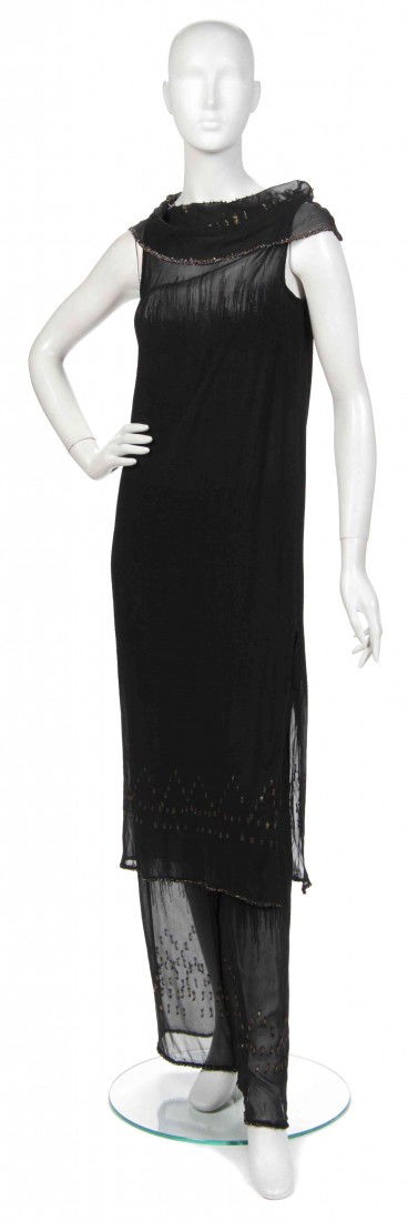 A Joan Vass Black Silk Chiffon and Lurex Dress,: A Joan Vass Black Silk Chiffon and Lurex Dress, with a sheer neckline and hemline, together with matching pants. Property from the Estate of Joan Vass, New York, New York