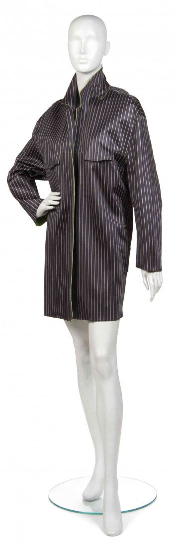 A Jean Paul Gaultier Navy Blue Pinstriped Jacket,: A Jean Paul Gaultier Navy Blue Pinstriped Jacket, with an acid green lining. Labeled: Jean Paul Gaultier. Property from the Estate of Joan Vass, New York, New York