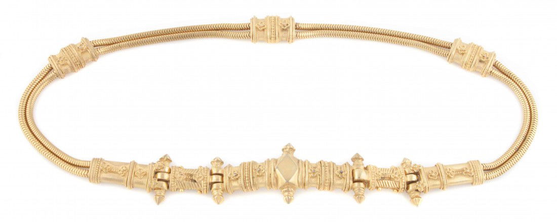 A Judith Leiber Goldtone Etruscan Motif Belt.: A Judith Leiber Goldtone Etruscan Motif Belt. Stamped: Judith Leiber.