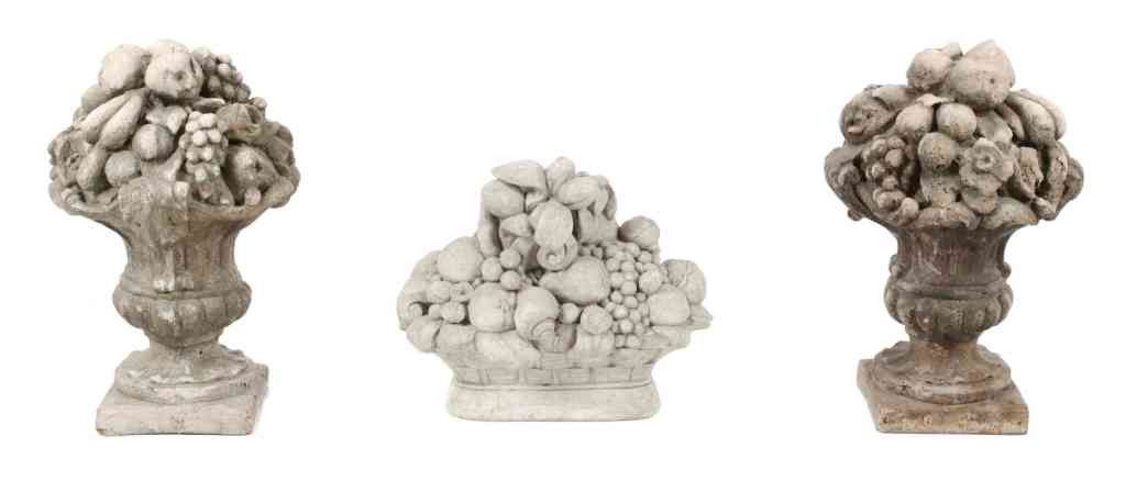 A Group of Three Composition Garden Ornaments, Heigh: A Group of Three Composition Garden Ornaments, depicting arrangements of fruit. Height of tallest 20 inches. Property from the Collection of Robert and David Smith, Michigan