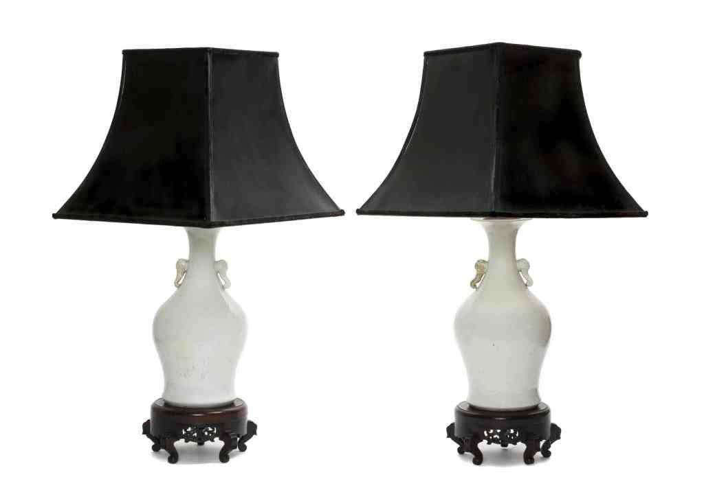 A Pair of Asian White Porcelain Table Lamps, Height: A Pair of Asian White Porcelain Table Lamps, of baluster form, having applied handles. Height 26 1/2 inches. Property from the Collection of Robert and David Smith, Michigan