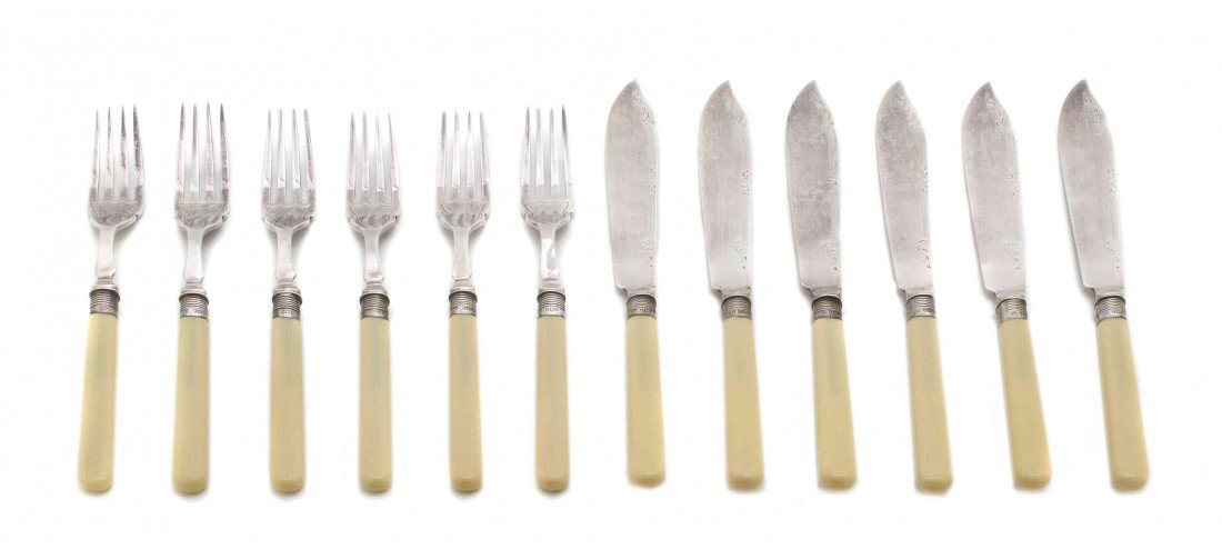 An English Sheffield Plate Fish Service for Six, Y: An English Sheffield Plate Fish Service for Six, Yates Brothers, comprising knives and forks, having bone handles. Length of knife 8 1/4 inches. Property from the Collection of Thomas H. Hughes Trust,