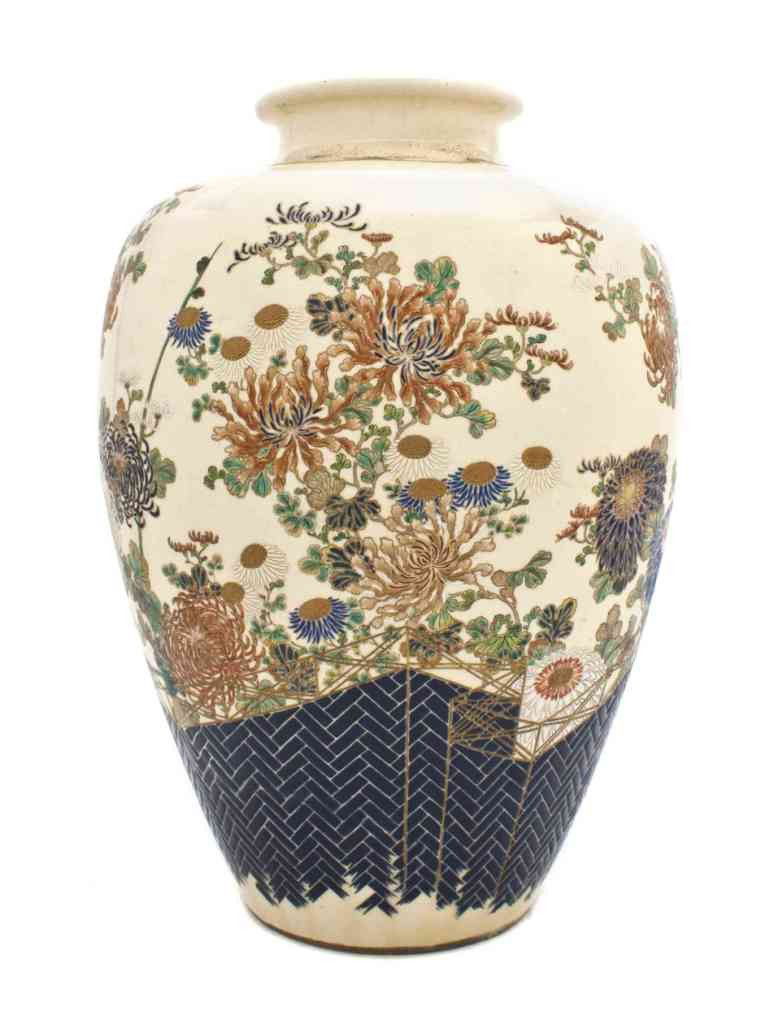 A Japanese Satsuma Earthenware Vase, Height 18 1/2: A Japanese Satsuma Earthenware Vase, of baluster form, having polychrome floral and foliate decoration, underside having four underglazed characters. Height 18 1/2 inches. Property from the Estate of