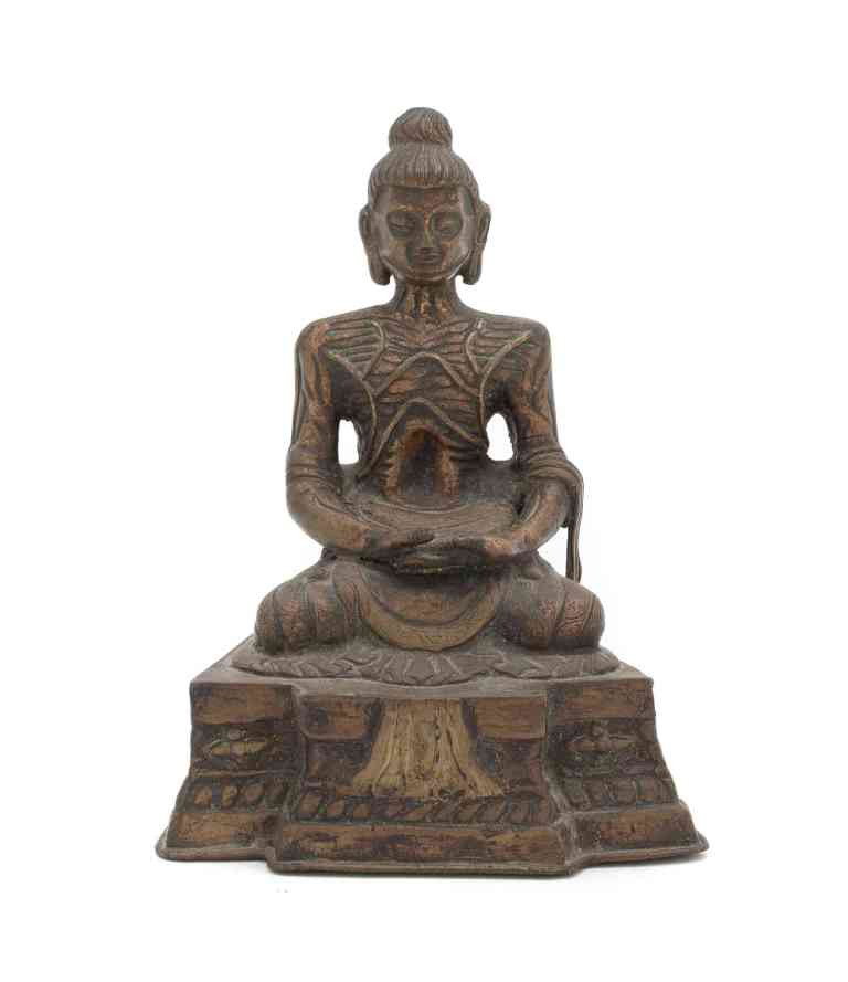 A Southeast Asian Copper Figure of a Lama, Height : A Southeast Asian Copper Figure of a Lama, 20th century, in a seated pose above a multi-tiered base. Height 7 1/2 inches. Property from the Collection of Walter Phelps Scott, San Miguel de Allende, Gu