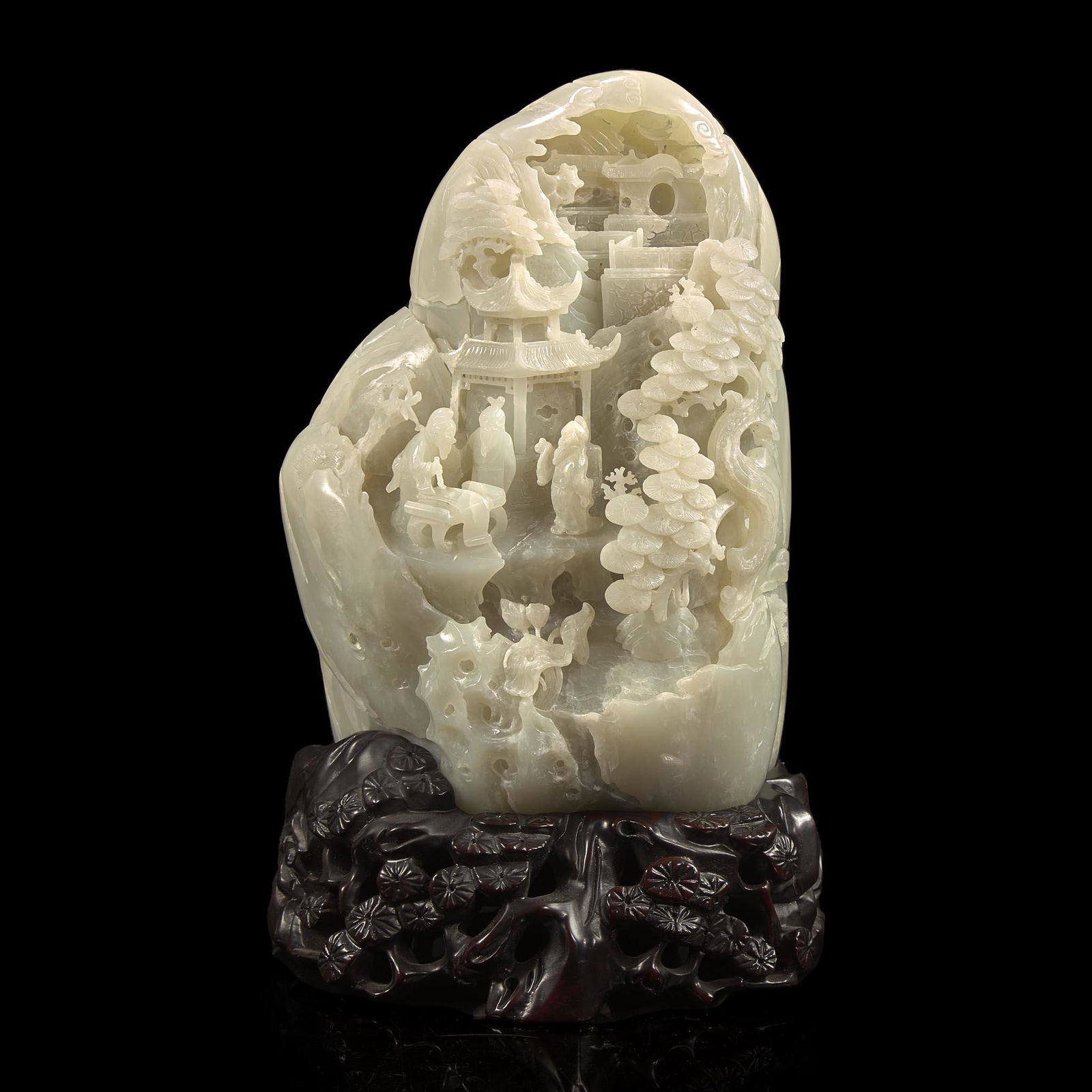 A Chinese carved greyish-white jade "Mountain" and carved wood stand 灰白玉山 (1 of 2)