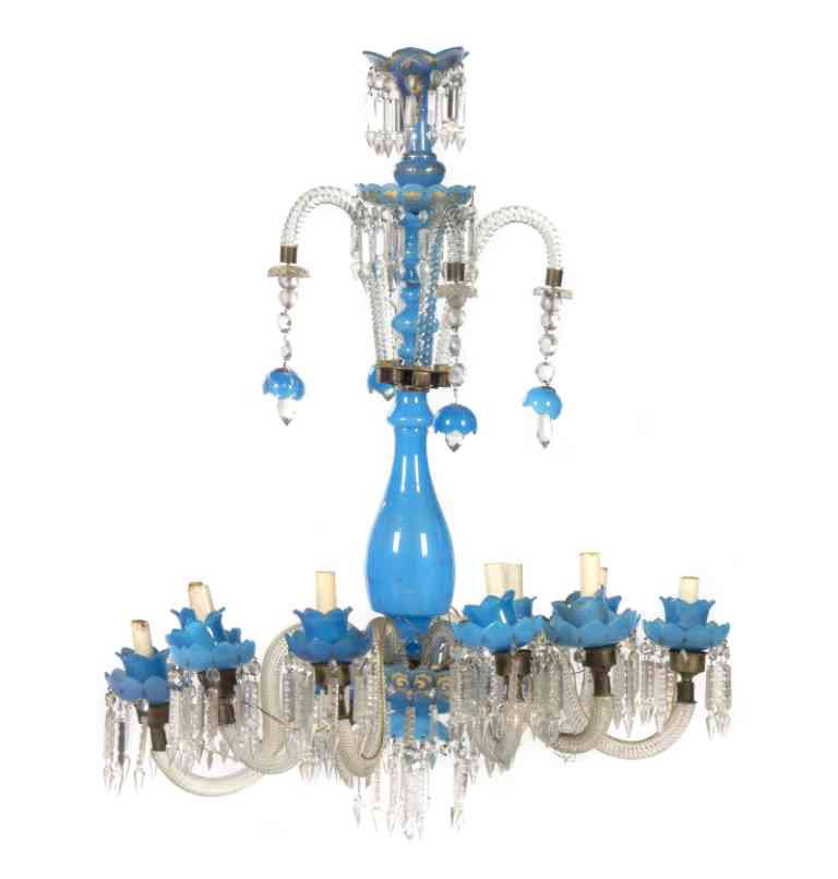 An Opaline Glass Ten-Light Chandelier, Height 35 i: An Opaline Glass Ten-Light Chandelier, the baluster form standard issuing colorless twisted S-scroll candle arms and opaline candle cups, hung with prisms and having gilt decoration throughout. Height