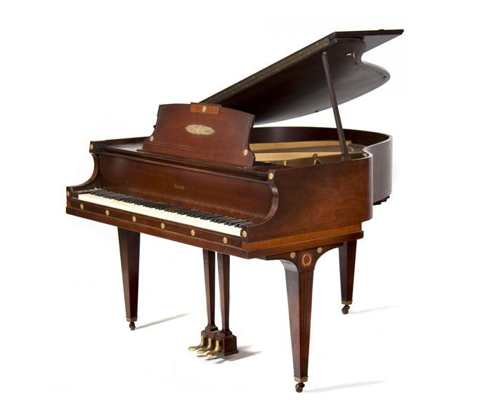 An Empire Style Gilt Bronze Mounted Piano, Howard,: An Empire Style Gilt Bronze Mounted Piano, Howard, serial number 76749, of typical form, raised on fluted tapering legs. Width 54 1/2 inches.