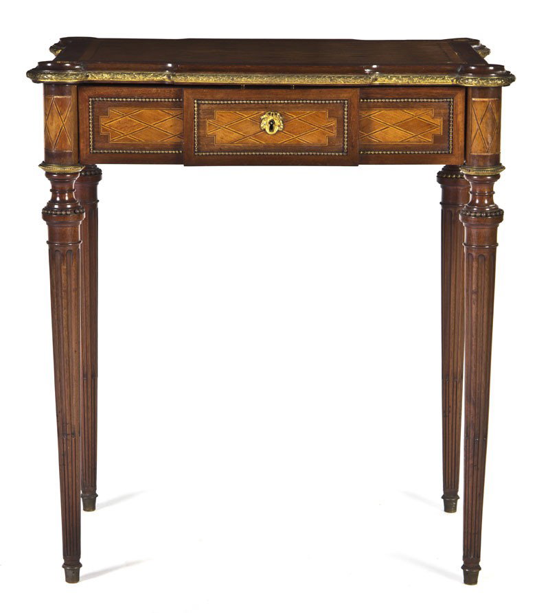 A Louis XVI Style Parquetry and Gilt Bronze Mounte: A Louis XVI Style Parquetry and Gilt Bronze Mounted Dressing Table, having a rectangular top with turret corners opening to a mirrored and fitted interior over the breakfront frieze, raised on fluted 