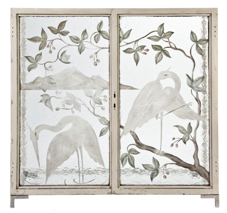 A French Stained Glass Inset Console Table, Height: A French Stained Glass Inset Console Table, having a rectangular glass top over the painted steel frame enclosing an acid etched window decorated with cranes, foliage and mountains. Height 38 1/2 x wi