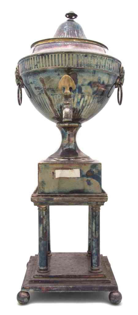 A Silverplate Hot Water Kettle on Stand, Height 27: A Silverplate Hot Water Kettle on Stand, the kettle of urn form with lion mask ring handles, the valve with wool handle, set on a portico form stepped base raised on spherical feet. Height 27 1/2 inch