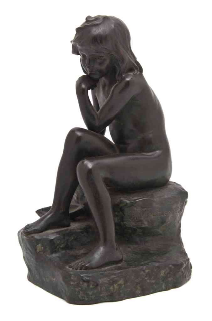 A French Bronze Figure, Odile Philippart Champeil,: A French Bronze Figure, Odile Philippart Champeil, depicting a nude girl sitting on a rock, a model of a boat at her side, signed Philippart Champeil, with Barbedienne foundry stamp. Height 8 1/2 inch