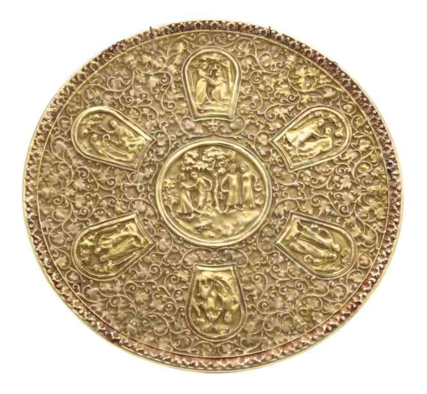 A Zsolnay Porcelain Plaque, Diameter 12 inches.: A Zsolnay Porcelain Plaque, having allover gilt decoration with molded panels decorated with figures and trees. Diameter 12 inches.