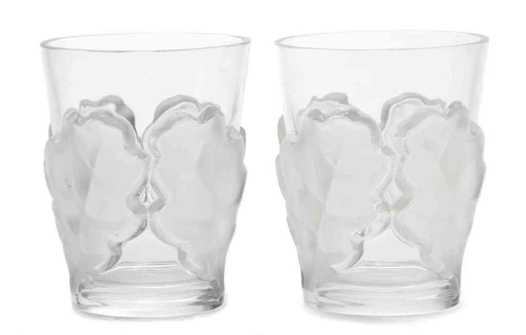 A Set of Ten Lalique Crystal Tumblers, Height 4 3: A Set of Ten Lalique Crystal Tumblers, in the Chene pattern, having frosted oak leaf decoration, base signed Lalique France. Height 4 3/8 inches. Property from the Estate of Dr. Joseph and Donna Lee B