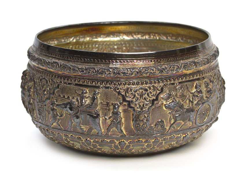 A Burmese Silver Rice Bowl, Diameter 7 1/2 inches.: A Burmese Silver Rice Bowl, having foliate bands with the central band of figures on horseback; approximate weight 19.61 ozt. Diameter 7 1/2 inches. Property from the Collection of Larry Faxon Diehl, 