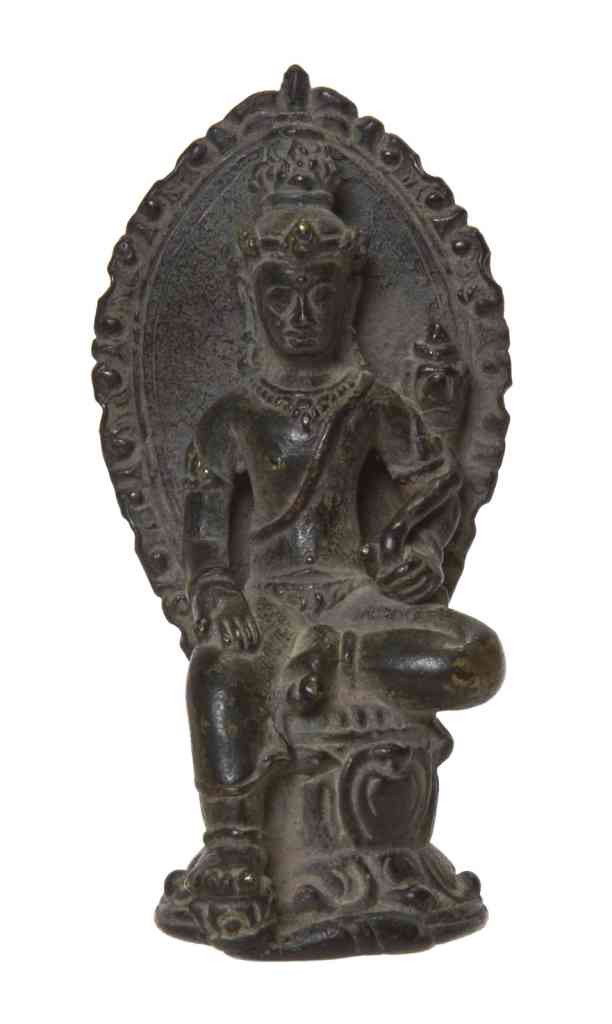 A Southeast Asian Bronze Model of Buddha, Height 3: A Southeast Asian Bronze Model of Buddha, depicted with shaped mandala and with one leg raised, seated on a double lotus blossom base. Height 3 5/8 inches. Property from a Private Chicago Collector
