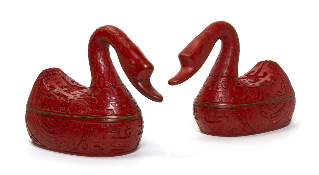 A Pair of Cinnabar Lacquer Ducks, Height 7 5/8 inc: A Pair of Cinnabar Lacquer Ducks, having geometric carved decoration. Height 7 5/8 inches.