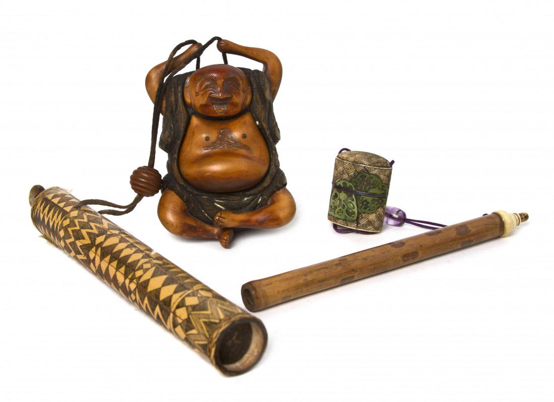 A Metal and Bamboo Needle Kit, Length of first 6 1: A Metal and Bamboo Needle Kit, having ivory mounted bamboo case, the metal need with ivory ring, having stained ivory inro-form ink case, together with a carved wood tobacco pouch and pipe-case. Lengt