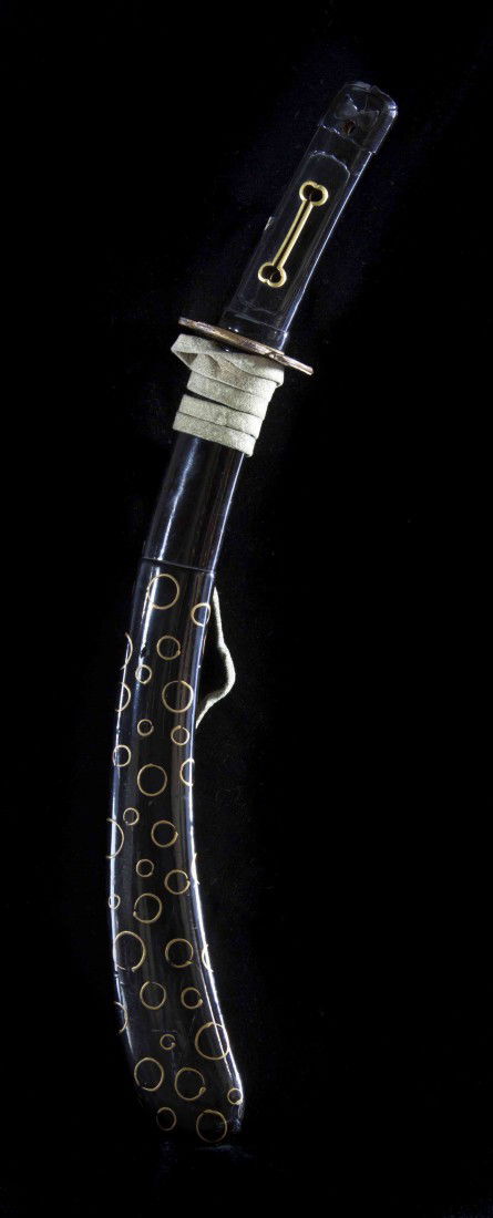 A Japanese Blade, Length of nagasa 13 1/2 inches.: A Japanese Blade, the steel blade with sharp curve, having lacquered wood handle and scabbard with leather covered metal tsuba. Length of nagasa 13 1/2 inches. Property from the Private Collection of