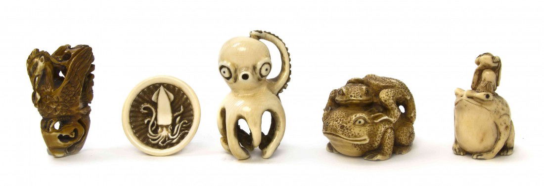 A Group of Netsuke of Animals, Height of tallest 2: A Group of Netsuke of Animals, depicting an ivory octopus, unsigned, a large toad with Ononotofu on its back of carved deer horn, unsigned, an ivory hat form with squid on the inside, unsigned, a thre