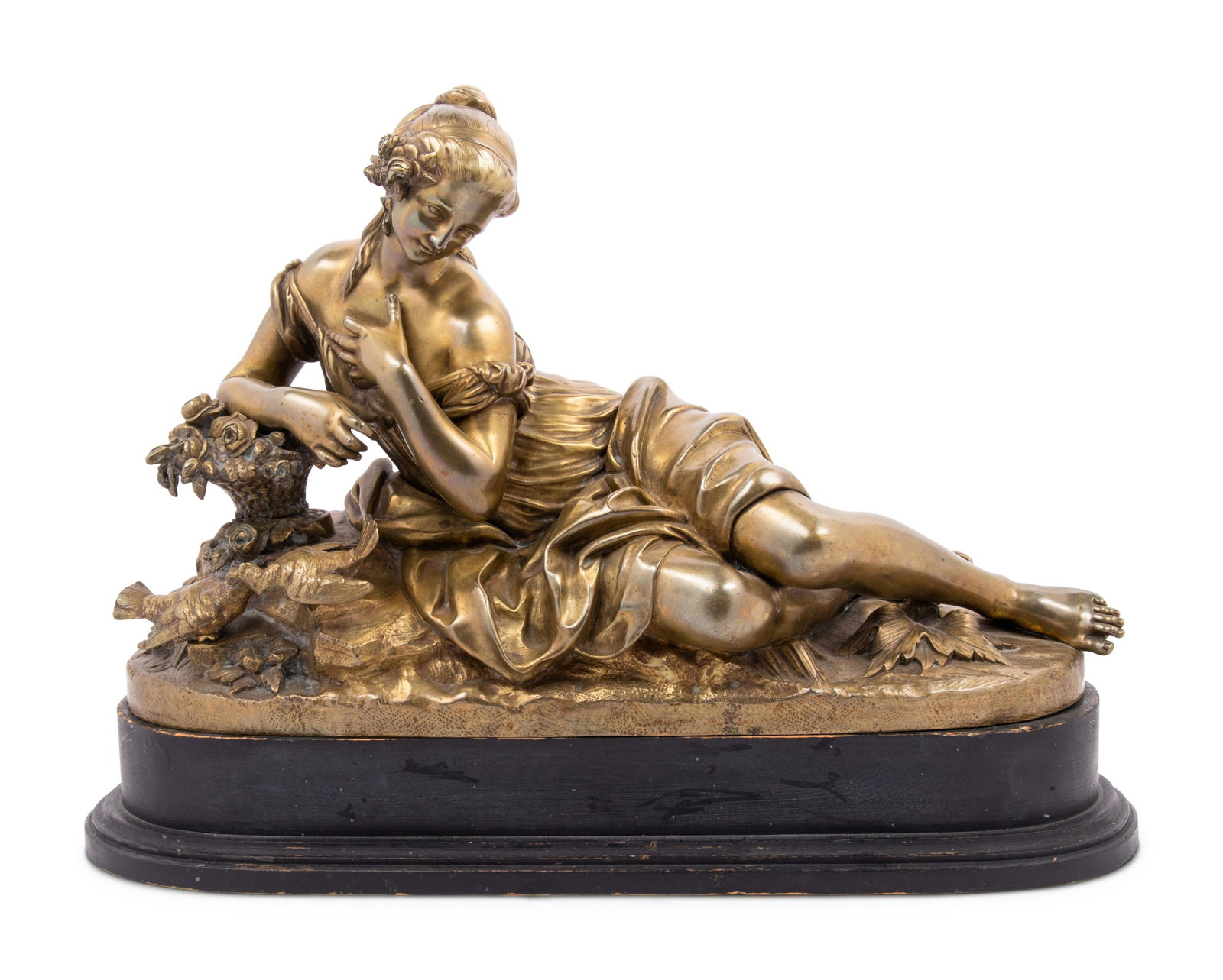 A Gilt Bronze Figure of a Reclining Woman: A Gilt Bronze Figure of a Reclining Woman Late 19th/Early 20th Century raised on a painted wood plinth. Height of bronze 10 3/4 x length 17 3/8 inches; height overall 13 3/8 inches.