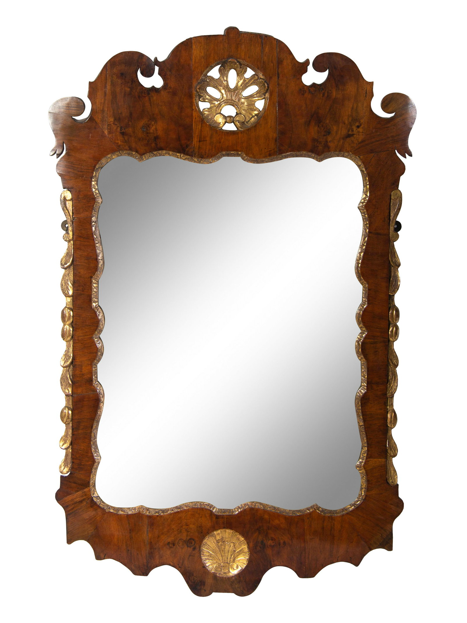 A George II Parcel Gilt Mahogany Mirror: A George II Parcel Gilt Mahogany Mirror 18th Century Height 47 x width 29 inches. Property from the Collection of Mr. and Mrs. Hale Irwin, St. Louis, Missouri