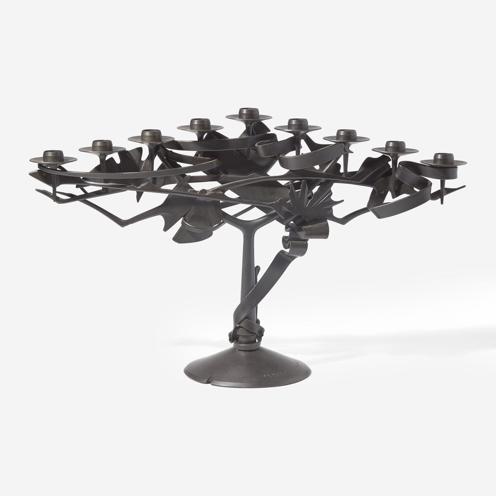 Albert Paley (American, b. 1944) Menorah, USA, 1995: Albert Paley (American, b. 1944) Menorah, USA, 1995 Wrought iron, blackened patinaImpressed signature and date: "© ALBERT PALEY 1995"Underside inscribed: "S·42-7" Note: This work is from