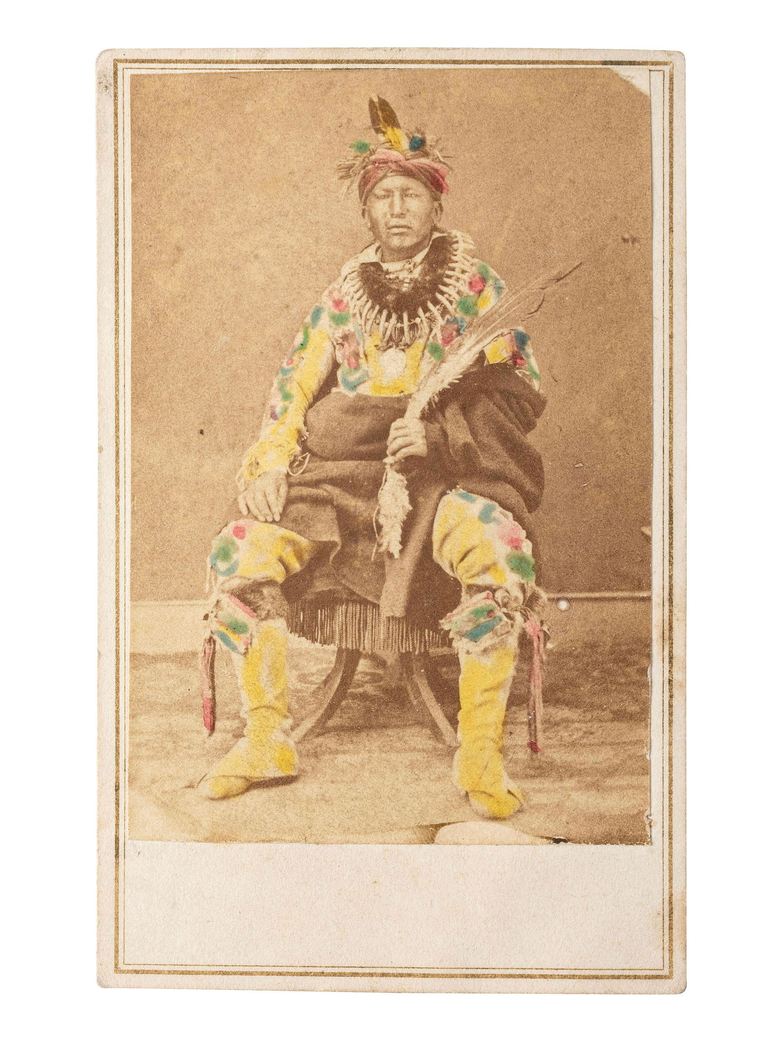 [NATIVE AMERICANS]. BARKER, A.W., photographer. Hand-colored CDV of Sac and Fox Chief, Red Stone. (1 of 2)