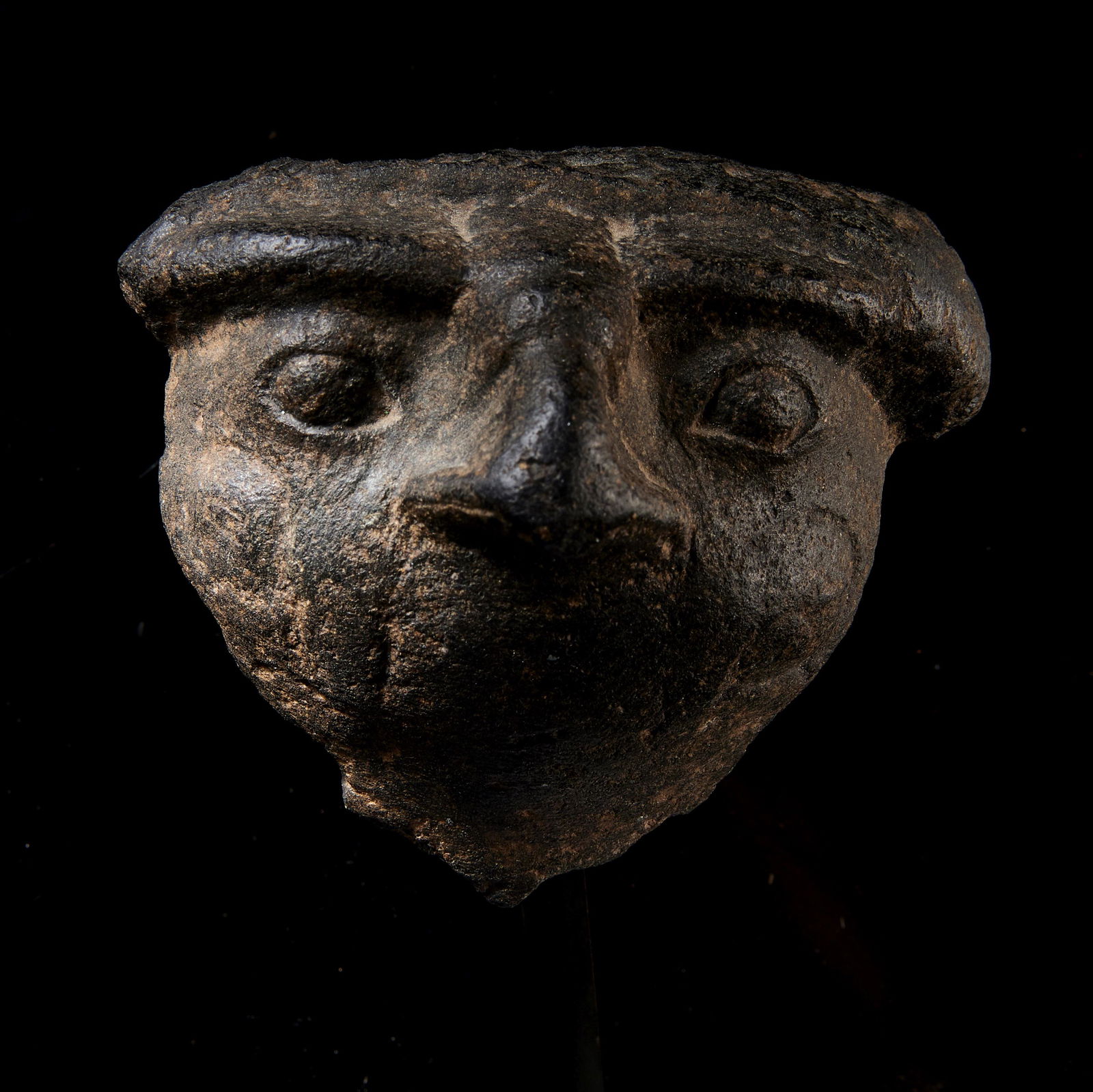 An Egyptian Basalt Falcon Face Fragment (1 of 6)