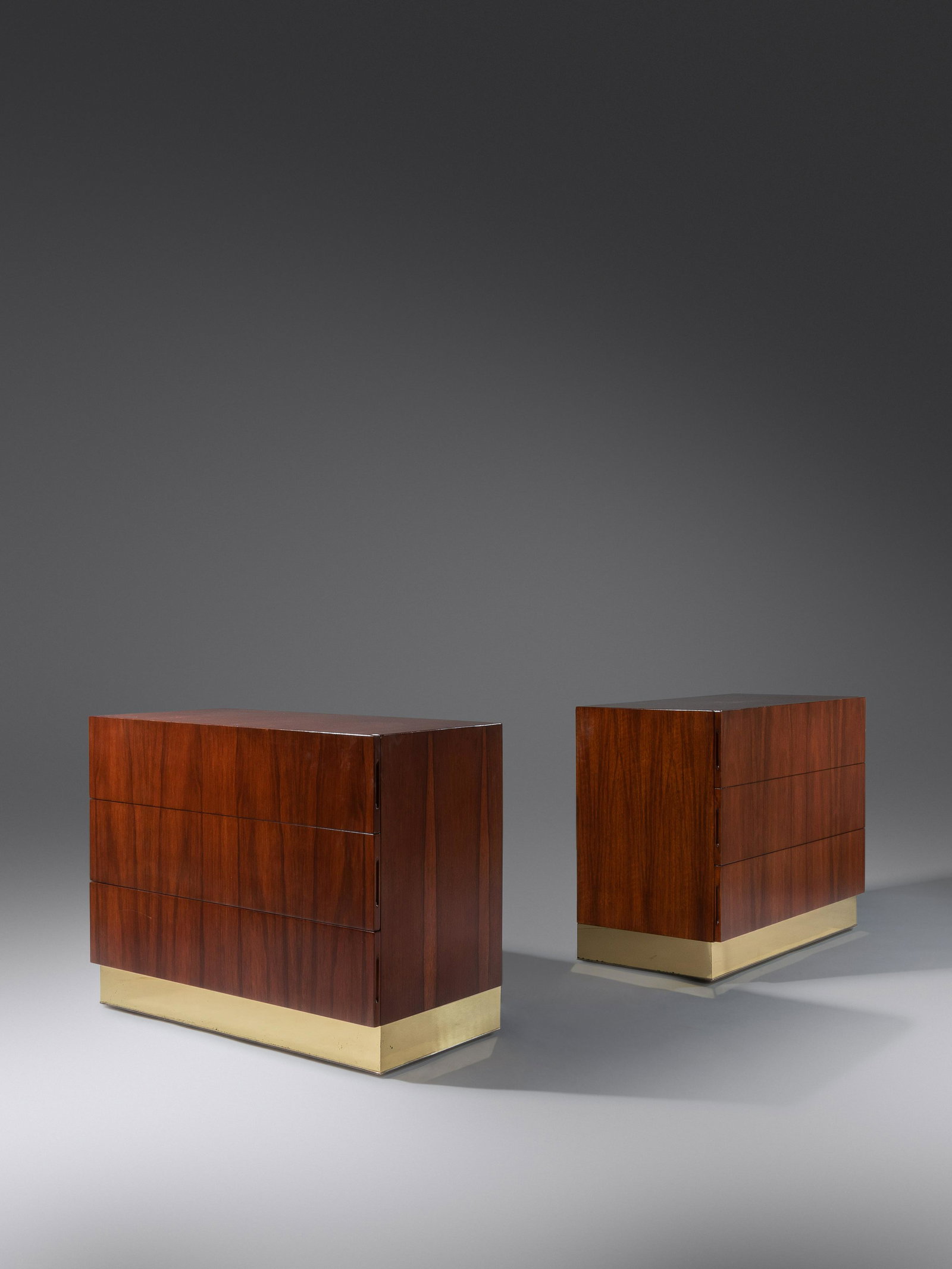 Milo Baughman (1923-2003) Pair of Three-Drawer Dressers Thayer Coggen, USA: Milo Baughman (1923-2003) Pair of Three-Drawer Dressers Thayer Coggen, USA rosewood, brass with manufacturer's label H 28 x W 36 x D 18 inches Provenance: Gary Rubinstein Antiques.