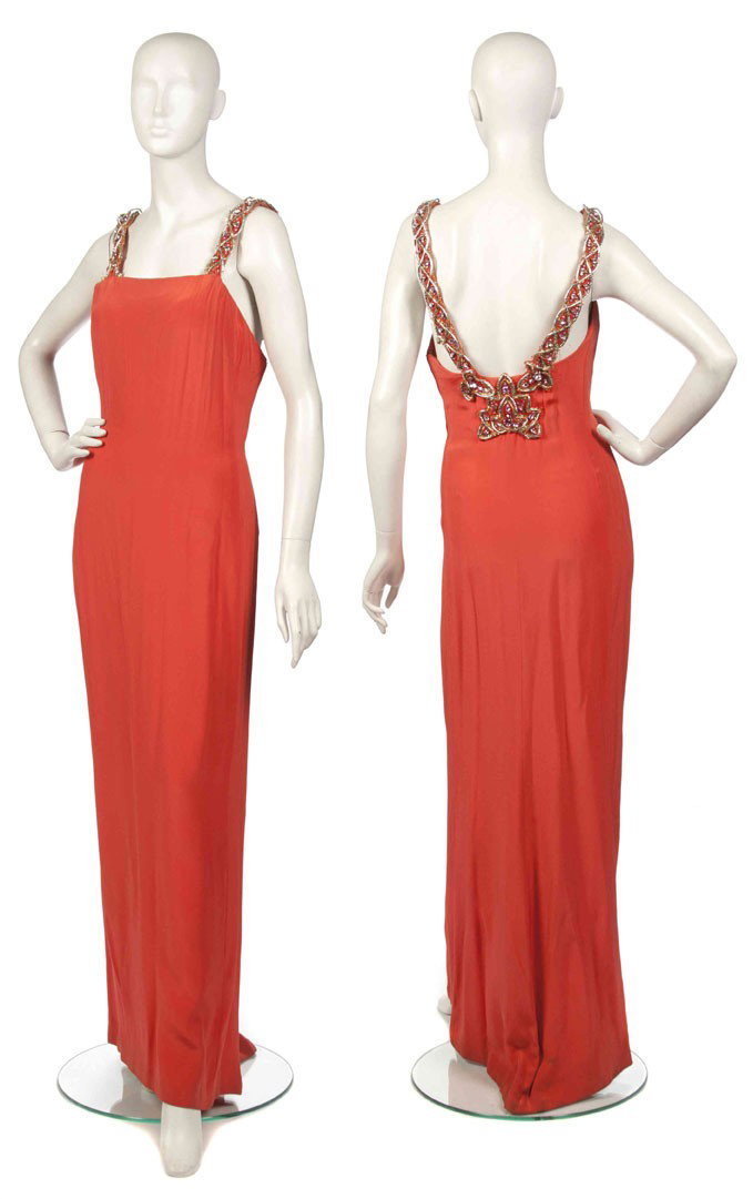 Andre Laug, (French, b. 1931), Evening Gown: Andre Laug (French, b. 1931) Evening Gown orange silk size 22.