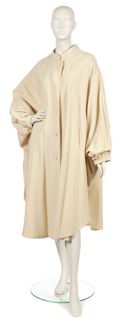 Givenchy, (French, b. 1927), Poncho: Givenchy (French, b. 1927) Poncho cream wool no size.